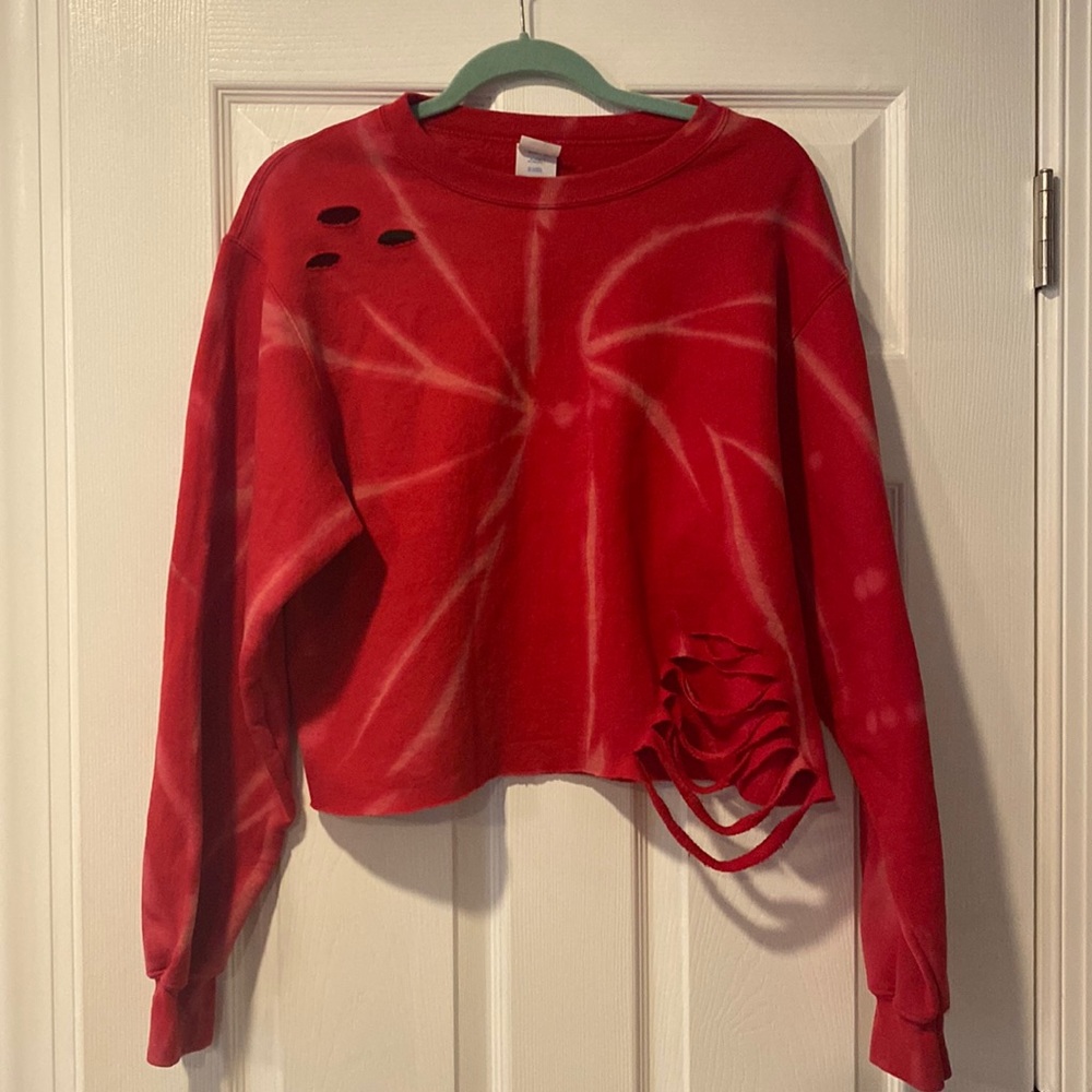 Red tie dyed ripped crew neck fleece sweatshirt